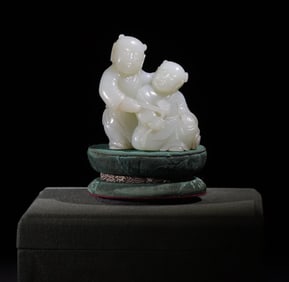 A Qing Dynasty Hetian jade double happiness boy ornament
