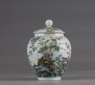 A Qing Yongzheng enamel flower and bird poetry lid jar