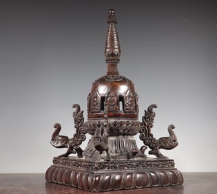 A Qing Dynasty agarwood dragon lotus petal pattern pagoda