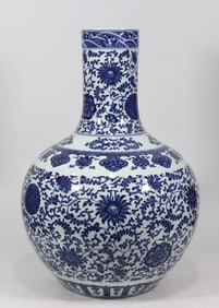 A blue and white entwined flower celestial ball vase made in the Qianlong period of the Qing Dynasty