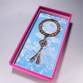 A piece of Qing Dynasty silver-gilt tourmaline inlaid eighteen hands