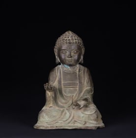 A bronze statue of Shakyamuni sitting Buddha in the Qing Dynasty
