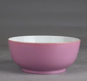 A pastel flower bowl in the Qing Yongzheng carmine ground