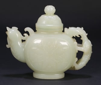 A Qing Dynasty Hetian jade dragon and phoenix pot