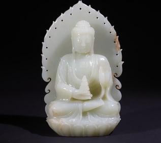 A Qing Dynasty Hetian green and white jade statue