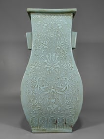 A Qing Dynasty turquoise green square piercing ear bottle with six patches
