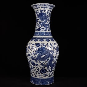 A Qing Dynasty blue and white dragon wearing an entwined vase