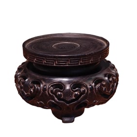 A rosewood openwork base