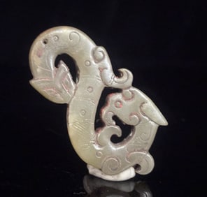 A Han Dynasty jade dragon and phoenix pendant