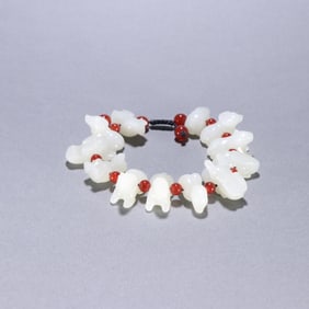 A Qing Dynasty Hetian jade zodiac bracelet
