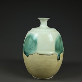 A Sui white glazed green plum bottle