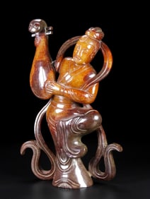 A Han Dynasty jade pipa girl