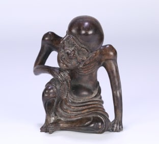 A Qing Dynasty Indian small-leaved rosewood skinny arhat ornament