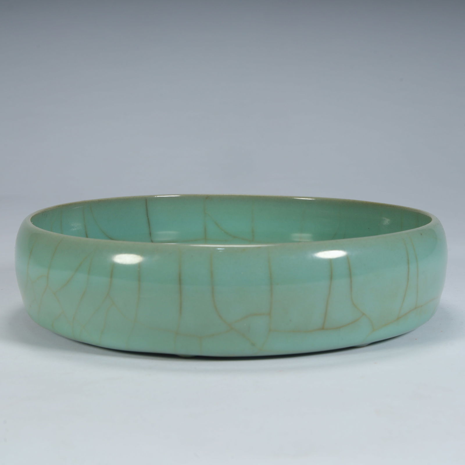 Qing Dynasty imitation Ru kiln azure glaze opening piece brush washing: Qing Dynasty imitation Ru kiln azure glaze opening piece brush washing Height 4.5cm, length 8.5cm, width 85cm, weight 885.7g (The Dimensions Of All Batches Are Manually Measured.If You Need More Detai