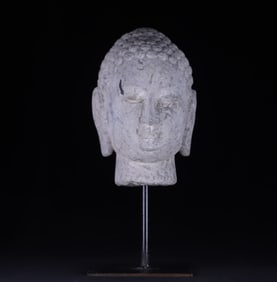 A stone carved Buddha head statue of the Song Dynasty