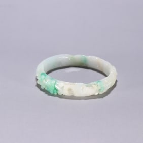 A Qing Dynasty jade plum pattern bracelet