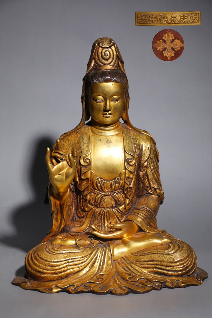 A seated statue of Guanyin Bodhisattva in the Ming Dynasty: Ming Dynasty finely cast copper tire gilt Guanyin Bodhisattva seated statue SIZE: Height 52cm, width 41cm, weight 15.9kg (The Dimensions Of All Batches Are Manually Measured.If You Need More Detailed