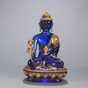 A Qing Dynasty glazed gilt Tara statue