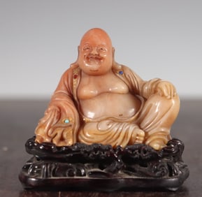 A statue of Maitreya Buddha in the Qing Dynasty Shoushan stone