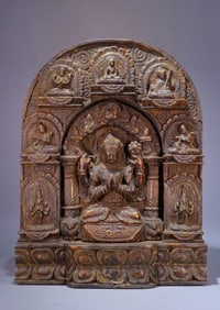 A Qing Dynasty agarwood four-armed Guanyin Buddha shrine