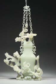 A Hetian jade relief auspicious cloud dragon hanging chain bottle