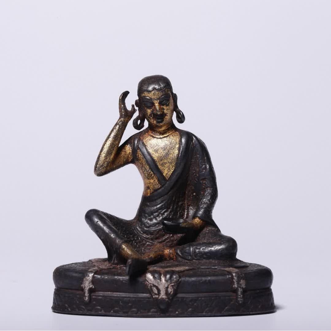 A Qing Dynasty iron-cut gold Milarepa statue: Qing Dynasty iron-cut gold Milarepa statue SIZE: H:5.5cm L:5.3cm W:3.4cm W:117g (The Dimensions Of All Batches Are Manually Measured.If You Need More Detailed Information, Please Contact Our Customer