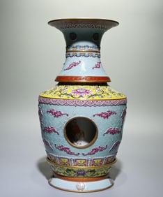 A Qing Qianlong enamel pattern carved Fushou Bandai heart vase