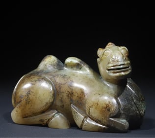 A Qing Dynasty jade camel ornament