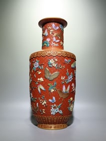 A Qing Dynasty Qianlong pastel coral red tortoise shell pattern carved butterfly love flower stick