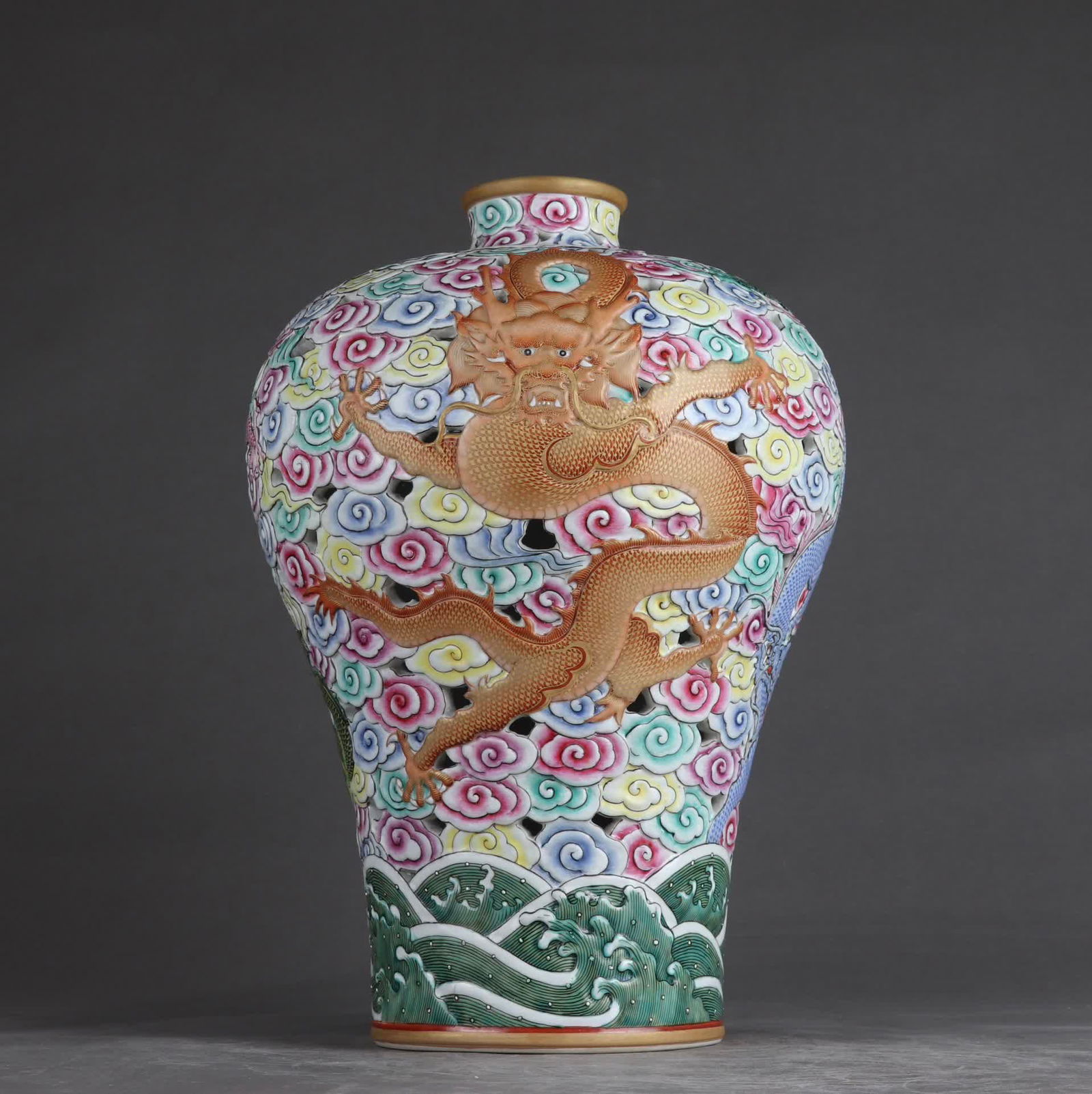 A Qing Qianlong pastel seawater five dragons auspicious cloud hollow plum bottle (1 of 9)