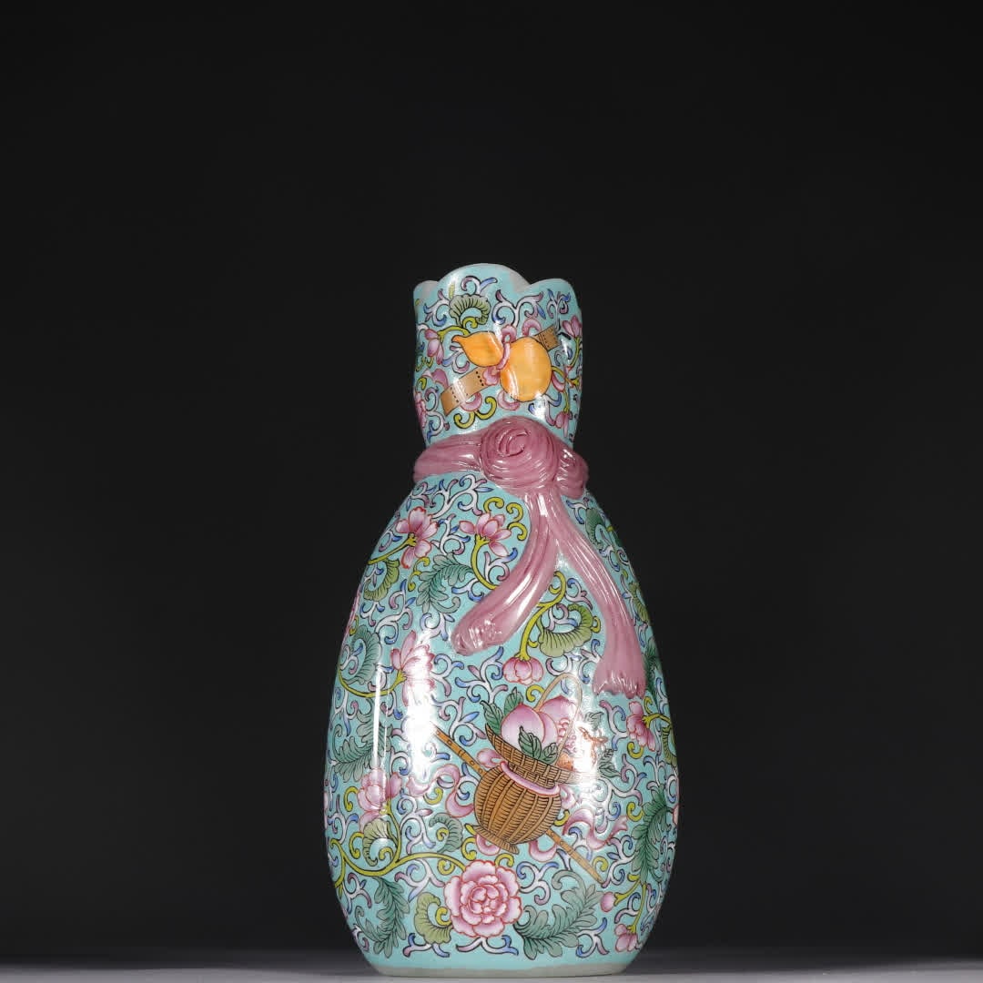 A Qing Dynasty glazed painting enamel entwined lotus pattern baggage bottle: Qing Dynasty glazed painting enamel entwined lotus pattern baggage bottle SIZE: H:19.4cm W:9.7cm W:614.7g (The Dimensions Of All Batches Are Manually Measured.If You Need More Detailed Information, Pl