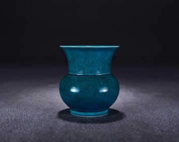 A Qing Qianlong blue glaze carved dragon and phoenix pattern slag bucket