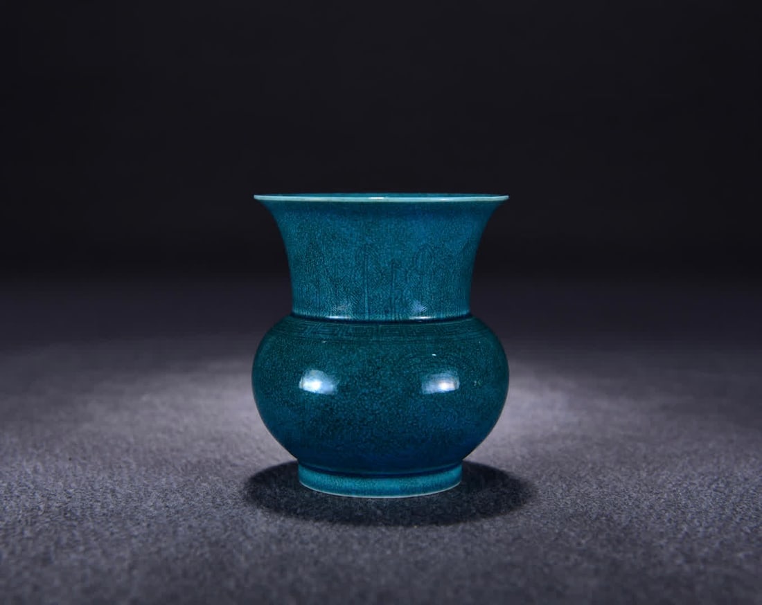 A Qing Qianlong blue glaze carved dragon and phoenix pattern slag bucket: Qing Qianlong blue glaze carved dragon and phoenix pattern slag bucket SIZE: H:10cm W:8cm (The Dimensions Of All Batches Are Manually Measured.If You Need More Detailed Information, Please