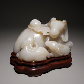 A piece of Qing Dynasty Hetian jade three sheep Kaitai
