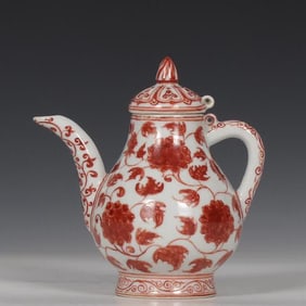 A Ming Xuande alum red entwined floral pattern pear-shaped pot