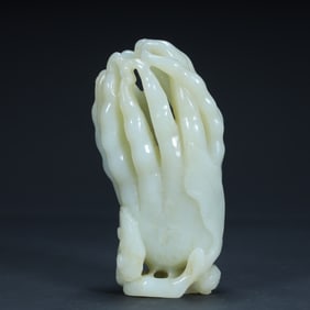 A Qing Dynasty Hetian jade "Buddha's Hand Presenting Rui" ornament