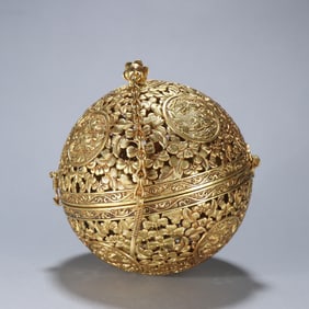 A copper-gilt engraved butterfly aromatherapy ball