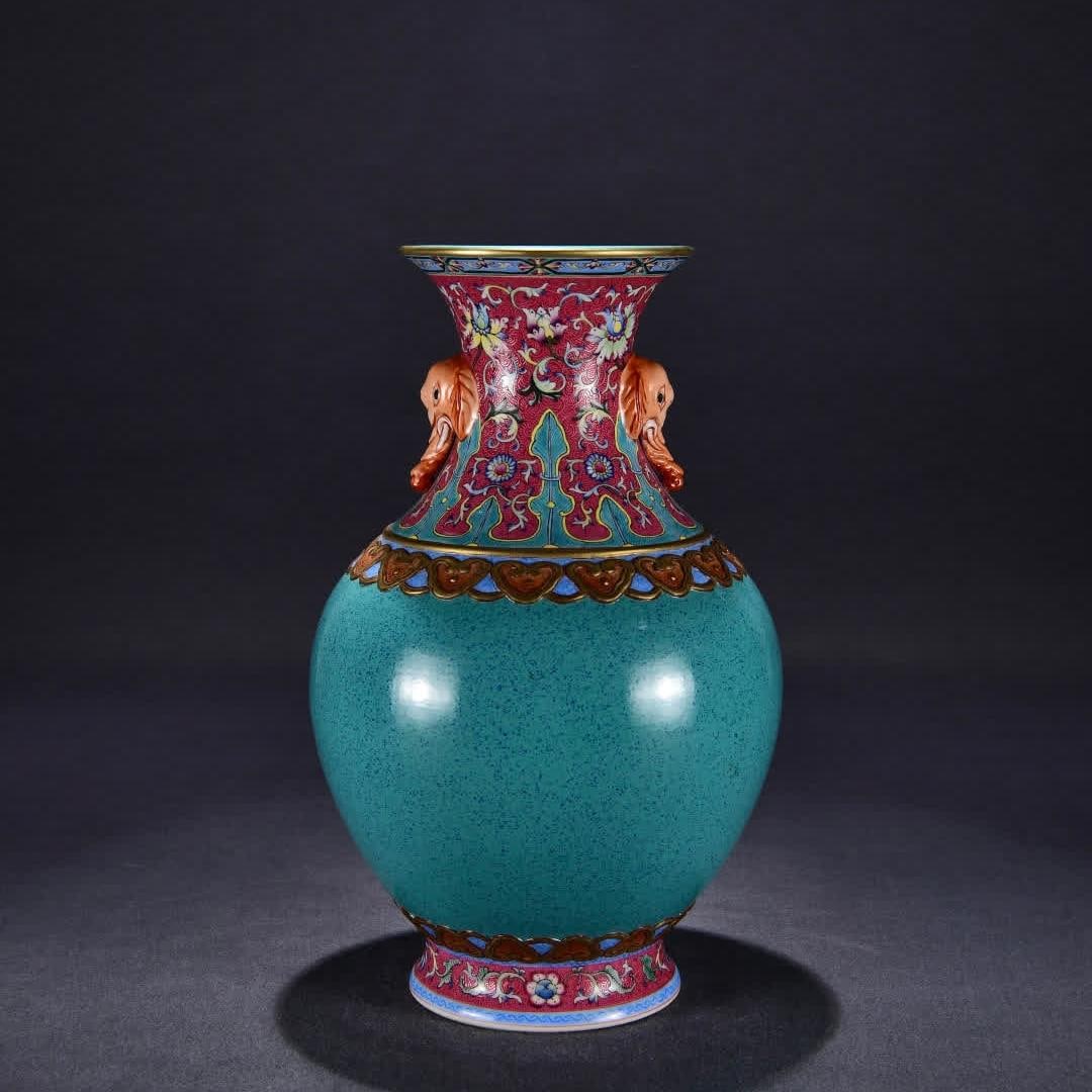 A Qing Qianlong carmine red ground lotus flower furnace glazed bottle (1 of 9)