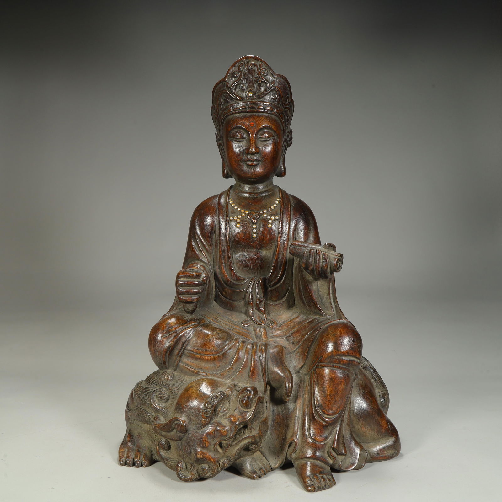 A Qing Dynasty agarwood carving statue of Manjushri Bodhisattva,: Qing Dynasty agarwood carving Manjushri Bodhisattva statue, SIZE: H: 40cm L: 27cm W: 21cm W: 1.4kg (The Dimensions Of All Batches Are Manually Measured.If You Need More Detailed Information, Please Co