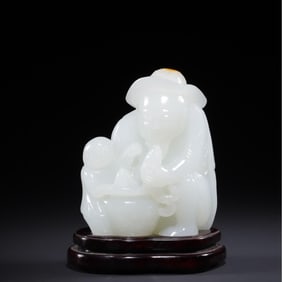 A Qing Dynasty Hetian jade fisherman ornament