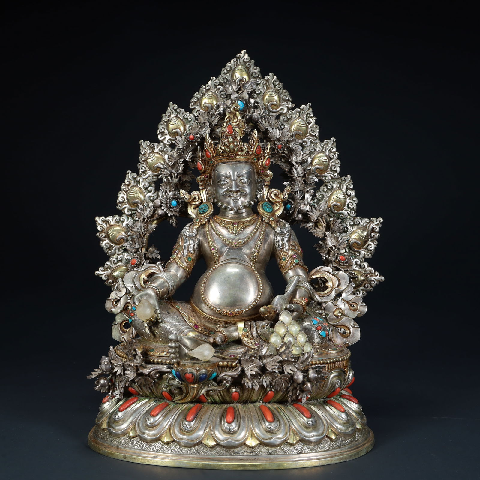 A Qing Dynasty silver inlaid treasure yellow statue of the God of Wealth: Qing Dynasty silver inlaid treasure yellow God of Wealth statue SIZE: H: 30cm L: 24cm W: 15cm W: 4.1kg (The Dimensions Of All Batches Are Manually Measured.If You Need More Detailed Information, Pleas