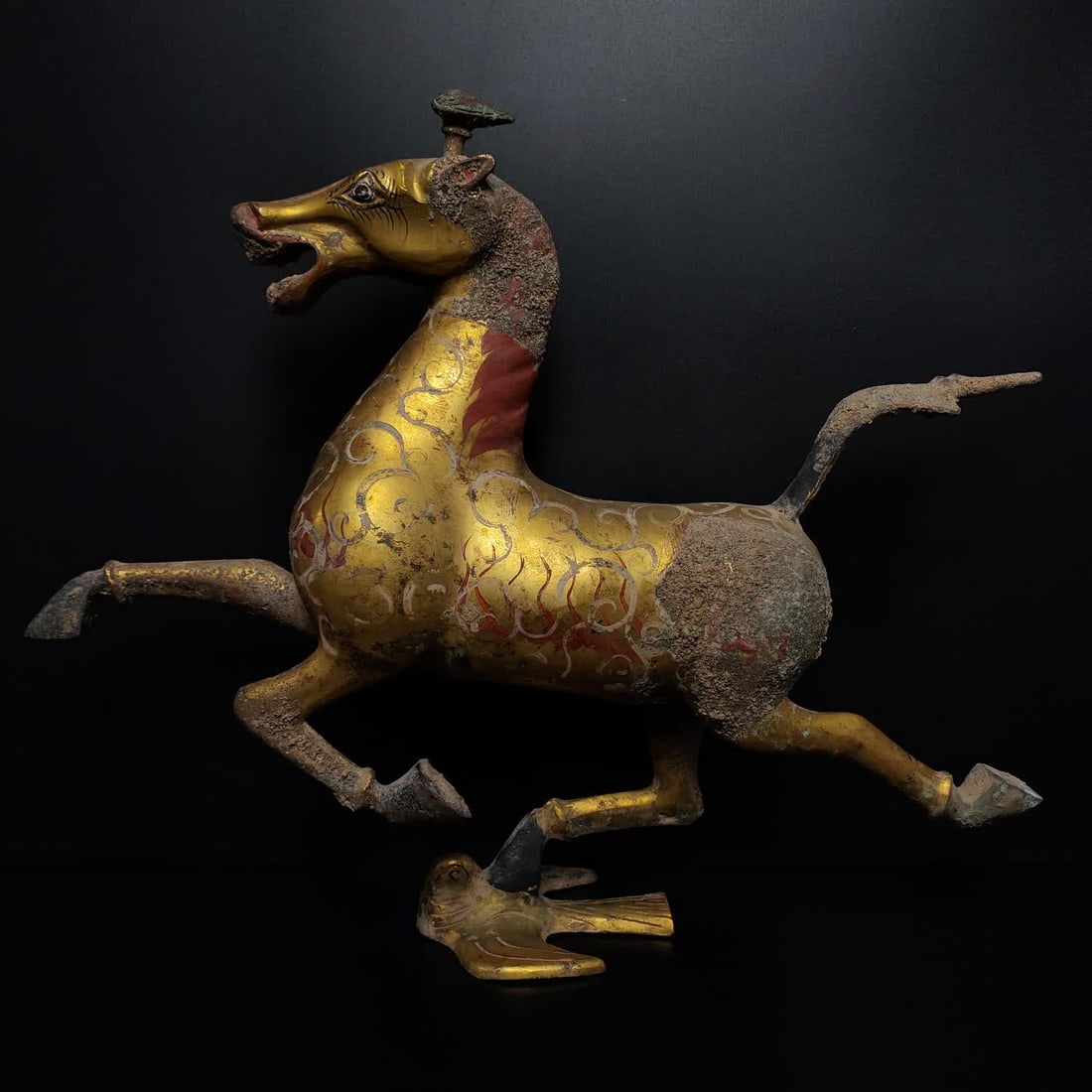 A bronze gilt painted horse of the Eastern Han Dynasty stepping on a flying swallow (1 of 9)