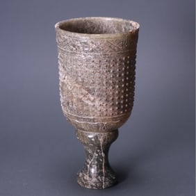 A piece of ancient jade valley pattern cup