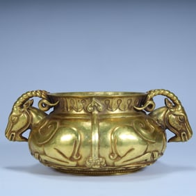 A Qing Dynasty gilt double sheep's ear incense burner