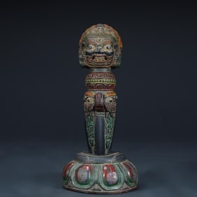 A Qing Dynasty Tibetan Buddhist stone carved painted Dharma protector vajra