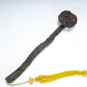 A Qing Dynasty rosewood carving "Ruyi ornament