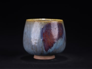 A Yuan Dynasty Jun kiln sky blue glaze purple spotted jar