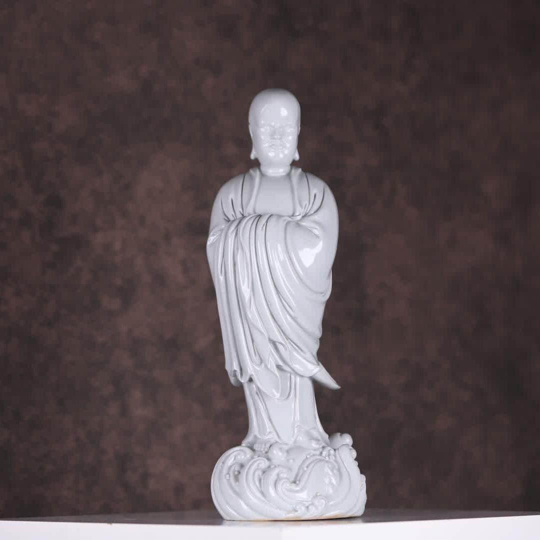 A statue of a white-glazed Arhat in a Dehua kiln in the Qing Dynasty (1 of 9)