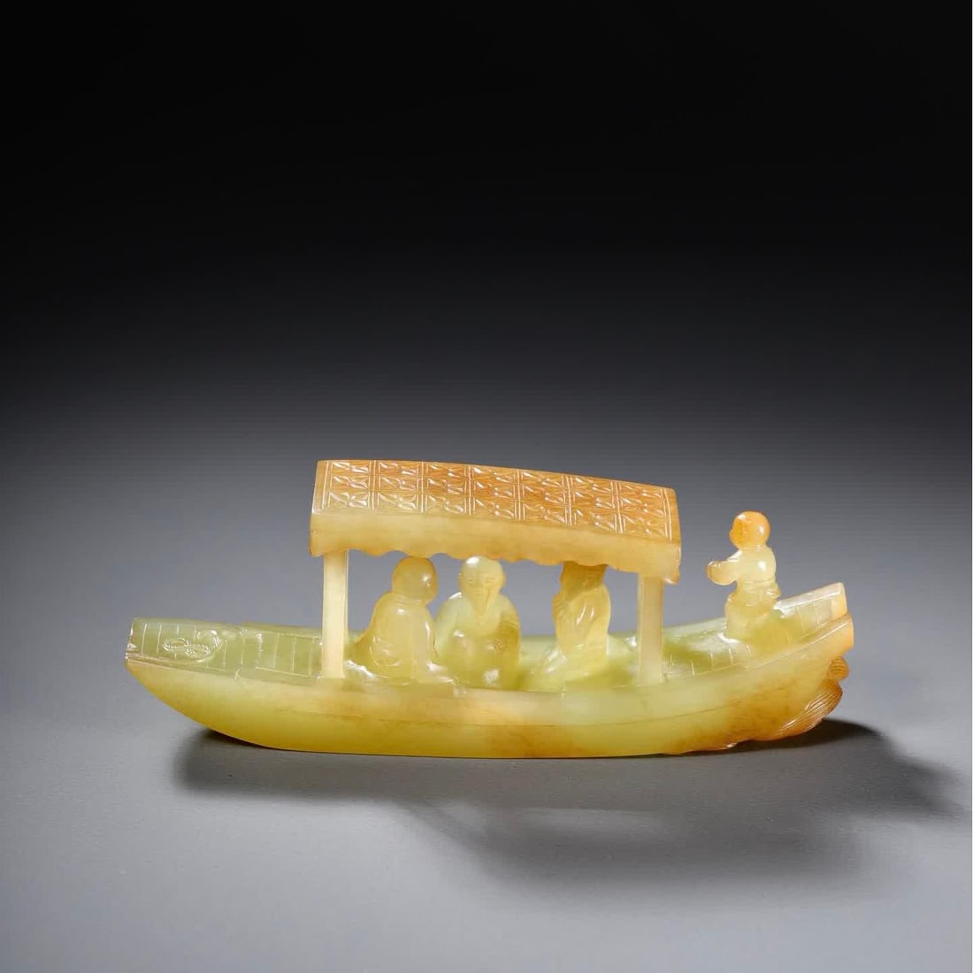 A Qing Dynasty Hetian topaz boat: Qing Dynasty Hetian topaz boat SIZE: 9.3x2.3x3.5cm W:67.3g (The Dimensions Of All Batches Are Manually Measured.If You Need More Detailed Information, Please Contact Our Customer Service Before Biddin