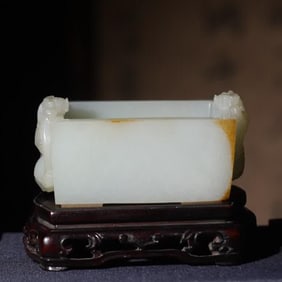 A Qing Dynasty gold-skinned double dragon ear jade square furnace